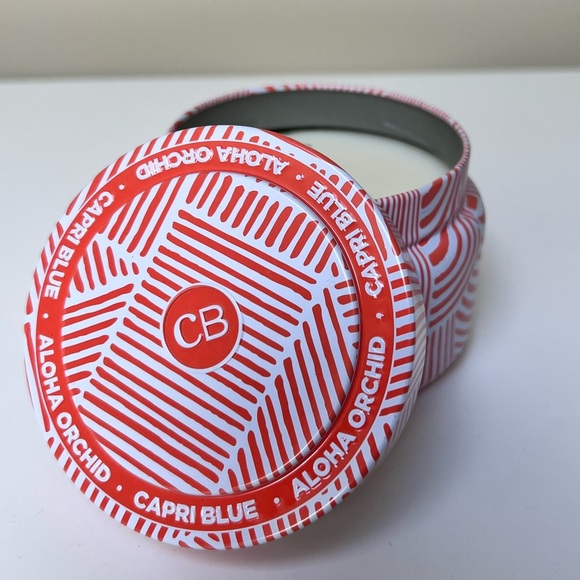 Capri Blue for Anthropologie SOLD OUT aloha orchid tin candle 8.5 oz. - Picture 2 of 4